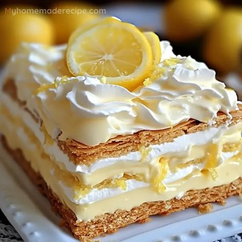 A refreshing No-Bake Lemon Eclair Cake that's easy to make and perfect for any lemon lover. No baking required! No Bake Yum Yum Dessert, No Bake Lemon Eclair Dessert, No Bake Lemon Eclair, Lemon Eclair Cake No Bake, No-bake Lemon Eclair Cake Recipe, Lemon Eclair Dessert, Lemon Dessert Recipes Easy Simple, Lemon Cake Desserts, What To Bake Desserts