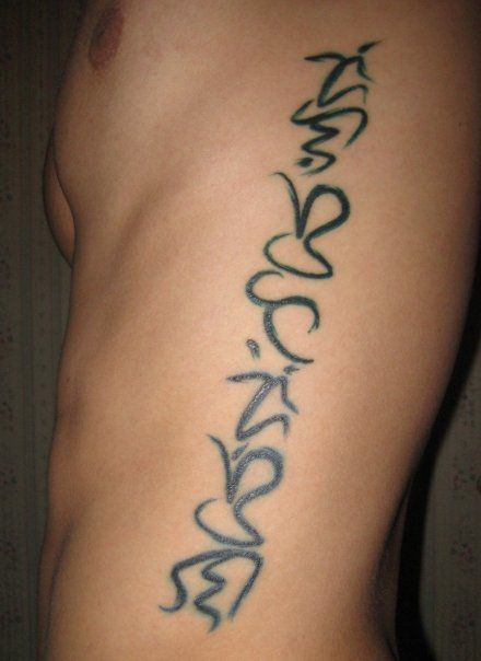 Filipino Baybayin tattoo Filipino Script, Alibata Tattoo, Baybayin Tattoo, Tattoos On Side Ribs, Night Tattoo, Filipino Tattoos, Ribcage Tattoo, Alien Tattoo, Dagger Tattoo