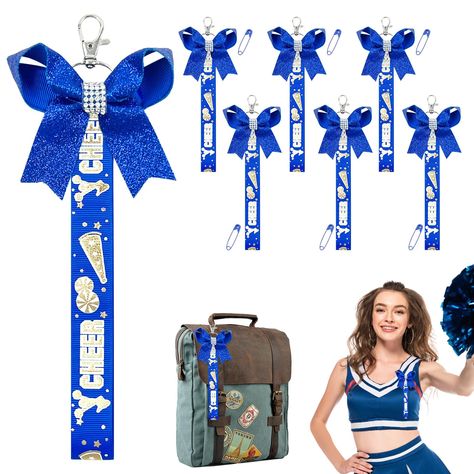 PRICES MAY VARY. THE RIGHT QUANTITY AND BEAUTY - Each pack includes 6 delicate blue cheerleader bow keychains and 6 pins, the right quantity is tailored for bulk users to choose as needed, the cheerleader keychains have a glossy finish with a shimmery finish that adds decorative charm to the keychains. FUN BACKPACK ACCESSORY - Our cheerleader keychains are the ideal decoration for any backpack, these glitter bow keychains have an eye-catching appearance that creates a cheerful atmosphere, a grea Cheerleader Keychains, Cheerleading Keychains, Cheer Nationals Gifts, Cheer Keychain, Cricut Materials, Cheer Crafts, Cheer Squad Gifts, Cheer Nationals, Fun Backpack