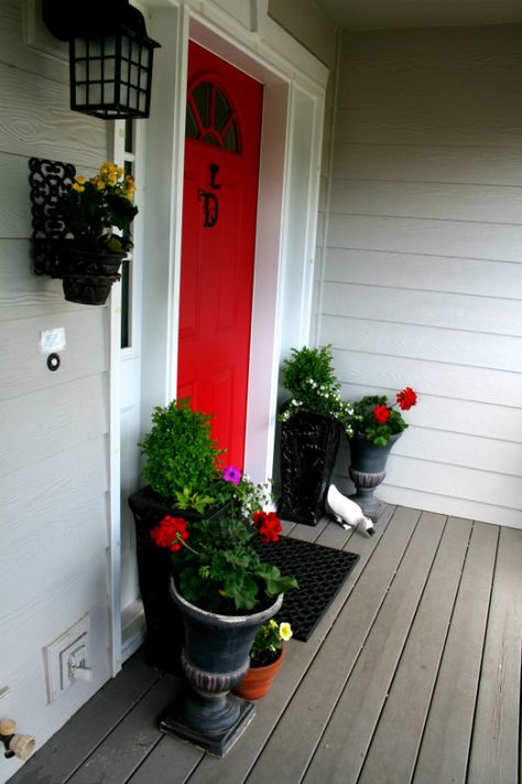 curb appeal - front porch red door | TodaysCreativeBlog.net  Color is Sherwin Williams- Positive Red.  House colors- Mindful grey and Gauntlet Grey Entrance Planters, Gauntlet Grey, Mindful Grey, Porch Appeal, Colored Door, Door Fixtures, Curb Appeal Ideas, Wood Porch, Red Front Door