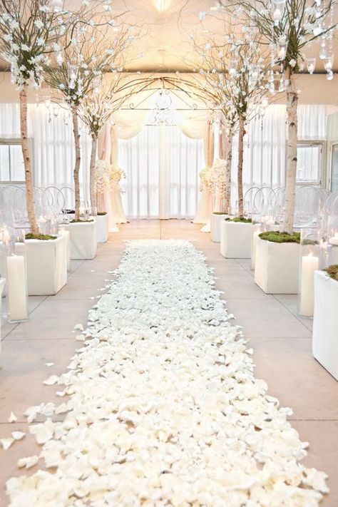 8 Winter Wedding Decor Trends You Can Plan for Now #purewow #marriage #wedding #home #trends #winter #decor Winter Wonderland Wedding Decorations, Wonderland Wedding Decorations, Rose Petal Aisle, Event Planning Guide, Ultimate Wedding Planning Checklist, Flower Girl Petals, Simple Beach Wedding, White Wedding Decorations, White Winter Wedding