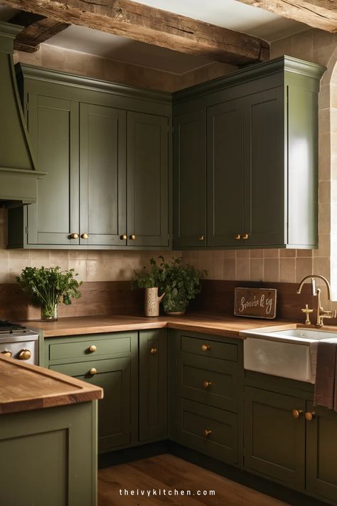 Looking for inspiration to elevate your kitchen decor? Check out these 30 Green Kitchen Designs that will transform your space effortlessly. Explore Sage Green Kitchens with cozy vibes and Dark Green accents that create a stunning aesthetic. Save this pin for ideas on incorporating Olive Green cabinets or a sleek Green Backsplash into your modern kitchen design. Let's bring some fresh energy into your home with beautiful Green Kitchen Ideas! Gothic Kitchen Green, Miss Green Kitchen Cabinets, Dark Sage Green Cabinets Kitchen, Green Cabinetry Kitchen, Pine Green Kitchen, Green Kitchen With Granite Countertops, Moss Green Cabinets, Green Kitchen Cabinets Brown Countertop, Green Cabinets Black Appliances