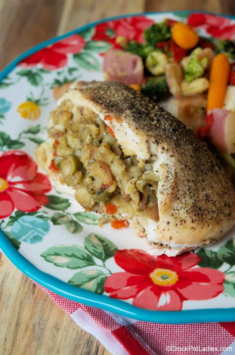 Crock-Pot Easy Stuffed Chicken Breasts - This recipe for Crock-Pot Easy Stuffed Chicken Breasts is great for weeknight dinners! Tender chicken breasts stuffed with stuffing and other goodies! [Low Cholesterol, Low Sugar & Weight Watchers friendly!] #CrockPotLadies #CrockPot #SlowCooker #ChickenRecipes #EasyRecipes #WeightWatchers #FrugalRecipes #EasyRecipes #5IngredientsOrLess Chicken Breast In Crock Pot, Chicken Breast Crock Pot, Chicken Breast Crockpot, Easy Stuffed Chicken Breast Recipes, Easy Stuffed Chicken, Easy Stuffed Chicken Breast, Crockpot Stuffing, Chicken Breast Crockpot Recipes, Main Recipes