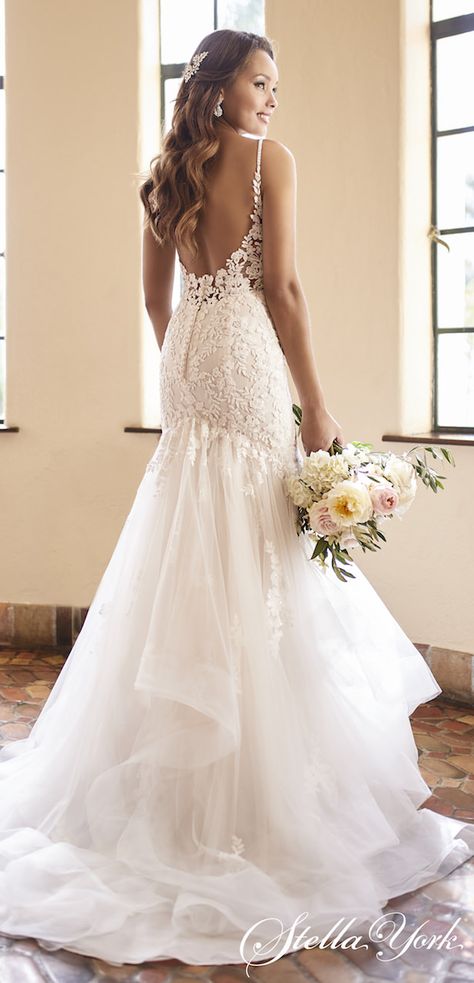 Beautiful mermaid wedding dress style with lace bodice, drop waist, spaghetti straps, open scoop back and layered trumpet tulle skirt | Stella York Wedding Dresses 2021 -7159 - Belle The Magazine #weddingdress #weddingdresses #bridalgown #bridal #bridalgowns #weddinggown #bridetobe #weddings #bride #dreamdress #bridalcollection #bridaldress #dress See more gorgeous bridal gowns by clicking on the photo Lace Wedding Dress Trumpet, Trumpet Mermaid Wedding Dress, Mermaid Tulle Wedding Dress, Spaghetti Strap Mermaid Wedding Dress, Beautiful Wedding Dresses Mermaid, Trumpet Style Wedding Dresses, Layers Wedding Dress, Wedding Dresses Drop Waist, Mermaid Wedding Dress With Straps