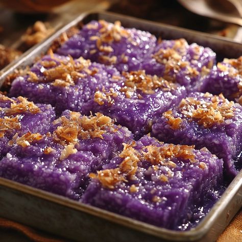 🍠🍚 Indulge in the rich, creamy goodness of Ube Biko—a Filipino favorite with a twist! 😋 #UbeBiko #FilipinoDessert Ube Biko Ingredients: Glutinous rice (2 cups) Coconut milk (2 cups) Ube halaya (1 cup) Sugar (1/2 cup) Water (2 cups) Coconut cream (1/2 cup, for topping) Instructions: Cook glutinous rice with water in a pot until tender. In a separate pan, heat coconut milk and mix in ube halaya and sugar. Stir until well combined. Add the cooked rice to the ube mixture and stir until the ri... Biko Filipino Recipe, Ube Biko, Panlasang Pinoy Recipe, Ube Halaya, Cozy Fall Recipes, Pinoy Recipes, Instagram Recipes, Filipino Desserts, Cooked Rice