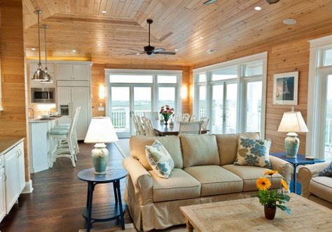 18 Beach Cottage Interior Design Ideas Inspired by The Sea Knotty Pine Living Room, Knotty Pine Decor, Wood Paneling Living Room, Lakeside House, Knotty Pine Walls, White Wood Paneling, Tan Sofa, Cottage Interior Design, Pine Walls