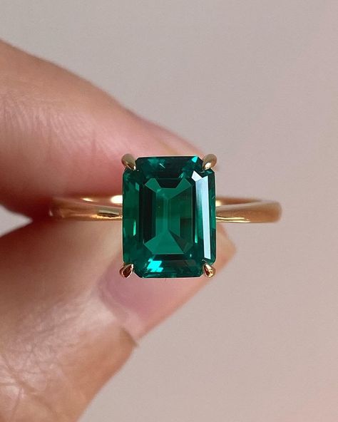 3.5CT Green Emerald Cut Moissanite Hidden Halo Set Solitaire Engagement Ring / Goldi Gifts Moissanite Jewelry Collections / 10KT Solid Yellow Gold Proposal Ring / Emerald Ring / Anniversary Gift Ring For Her / Bridal Ring / Women Ring / Moissanite Ring. SKU: SS_0035 ✥ 𝐌𝐚𝐢𝐧 𝐒𝐭𝐨𝐧𝐞 𝐃𝐞𝐭𝐚𝐢𝐥𝐬 ↣ Shape: Emerald Cut ↣ Type: Moissanite ↣ Weight: 3.58 Ct (App.) ↣ Dimension: 10x8 MM (App.) ↣ Color: Green ↣ Clarity: VVS ↣ Making Process: Handmade - Crafted by our experienced team ✥ 𝐑𝐢𝐧𝐠 𝐃𝐞𝐭𝐚𝐢𝐥𝐬 ↣ Band Width: 1.80 MM (± 0.10) [Customization Possible] ↣ Metal Purity: Solid Gold (10KT, 14KT, 18KT); Silver (925 Sterling, 935 Argentium), 950 Platinum ↣ Metal Tone: Yellow, White, Rose ↣ Stamp/Hallmark: Yes ❁❁ 𝐉𝐞𝐰𝐞𝐥𝐫𝐲 𝐂𝐞𝐫𝐭𝐢𝐟𝐢𝐜𝐚𝐭𝐞 ❁❁ ↣ Goldi Gifts branded authentica Rectangle Gemstone Ring, Emerald Rectangle Ring, Rectangle Emerald Engagement Ring, Minimalist Emerald Ring, Rectangle Emerald Ring, Engagement Ring Minimalist, Smaragd Ring, Emerald Wedding Rings, Moissanite Engagement Ring Solitaire