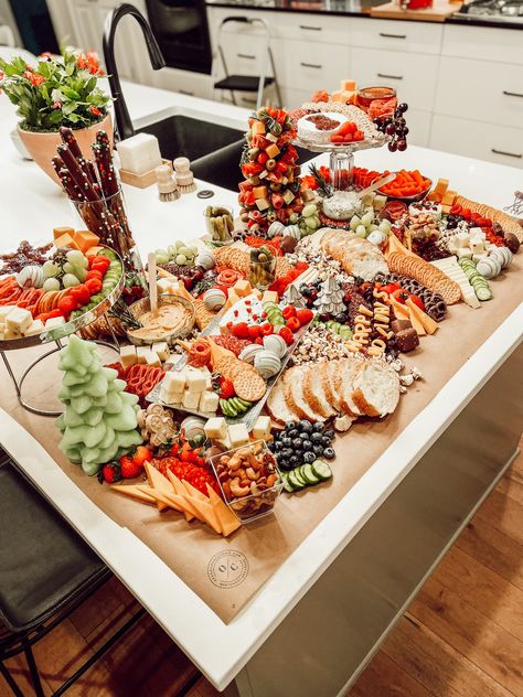 Christmas Charcuterie for a Jolly Holiday Dinner | Ozark Charcuterie | Enjoy a Christmas-themed charcuterie spread at your Holiday Dinner! Create a cozy and festive atmosphere for your gathering with tasty charcuterie boards, perfect for sharing during this merry season. Charcuterie provides a delicious and adorable feast for family and friends to enjoy. #charcuterie #charcuterieboard #grazetable #charcuteriecup #smallbusiness #christmascharcuterie #christmas Christmas Charcuterie Spread, Christmas Spread Table, Christmas Charcuterie Table, Charcuterie Labels, Winter Charcuterie Board, Christmas Grazing Table, Holiday Charcuterie Board Ideas, Charcuterie Tables, Holiday Charcuterie