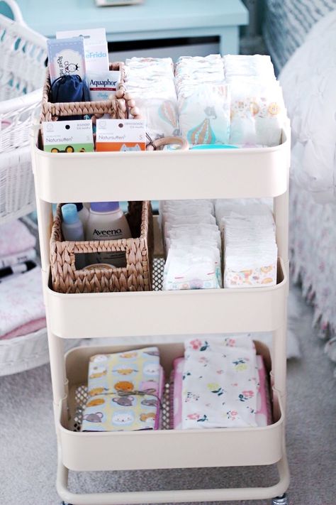 New Mom Essentials. The IKEA diaper changing cart with a list to all the necessities on the blog here. Raskog Ikea, Ikea Nursery Hack, Perlengkapan Bayi Diy, Nursery Hacks, Ikea Raskog, Ikea Desk Hack, Ikea Nursery, Baby Room Organization, Baby Storage