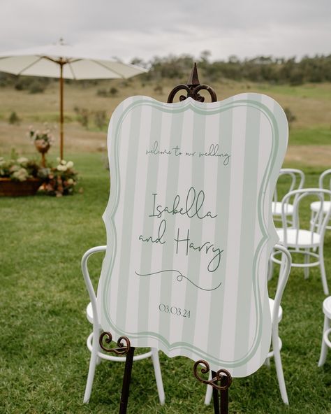 This vintage inspired welcome sign is bringing all of those Bridgerton vibes. Those soft mint stripes paired with the script font and ornate shape bring romance and softness to the day. Paired with the perfect easel and you have yourself a garden wedding fit for the queen! Garden Wedding Signage Ideas, Garden Wedding Signs, Garden Party Sign, Garden Party Wedding Signage, Garden Wedding Welcome Sign, Garden Wedding Details, Whimsical Wedding Signage, Vintage Wedding Details, Garden Wedding Signage