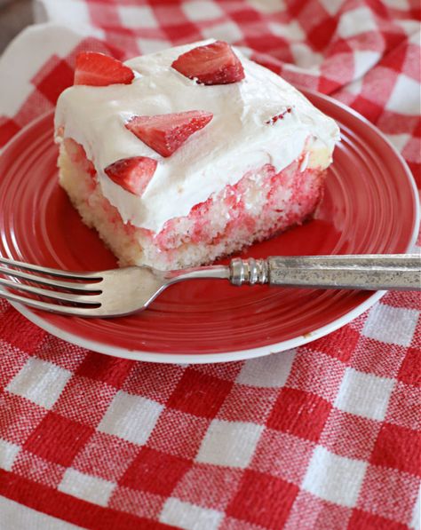 Strawberry Soda Pop Cake. This Strawberry Soda Pop Cake is pure heaven! A doctored up white cake mix base with strawberry soda sauce that trickles down through the crumbs, then vanilla pudding, whipped topping and fresh strawberries to finish it off! #sodapopcake #strawberrycake #cake #dessertrecipes #strawberrydessert Strawberry Soda Cake, Strawberry Pop Cake, Strawberry Pop Cake Recipes, Doctored Up Strawberry Cake Mix Recipes, Strawberrycake Cake, Strawberry Soda Pop Poke Cake, Strawberry Lemonade Poke Cake Recipe, Soda Pop Cake, Strawberry Lemonade Poke Cake