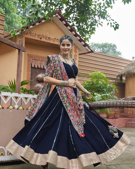 Moderate orange and blackBlue in blossom!!! Add our navy blue lehenga with embroidery full mirror work with viscose rayon dupatta to draped in your style in this navratri festival ✨💙 SHOP NOW 🛍️ gotifab.com [lehengacholi, navratri lehengas, navratri collection, garba outfits, navratri chaniya choli, lengha choli] #lehengacholi #navratrilehenga #navratricollection #chaniyacholis #garbaoutfits #gotifab Traditional Chaniya Choli For Navratri, Gujarati Chaniya Choli, Traditional Chaniya Choli, Chaniya Choli For Navratri, Dupatta Draping Styles, Garba Chaniya Choli, Dupatta Draping, Garba Outfit, Navratri Lehenga