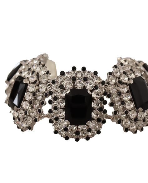 Dolce & Gabbana Elegant Crystal Choker Necklace https://www.thegraycrab.com/products/dolce-gabbana-elegant-crystal-choker-necklace Adorn your neckline with the epitome of elegance with this stunning Dolce & Gabbana choker necklace. This accessory is the perfect blend of luxury and craftsmanship, featuring a dazzling mix of clear and black crystals set against a lustrous silver-tone backdrop. Its exquisite design secures with a lobster clasp closure, ensuring a comfortable fit for any specia... Elegance Fashion, Accessories Model, Intimate Dinner, Crystal Choker Necklace, Crystal Choker, Crystal Set, Black Crystals, Exquisite Design, Crab