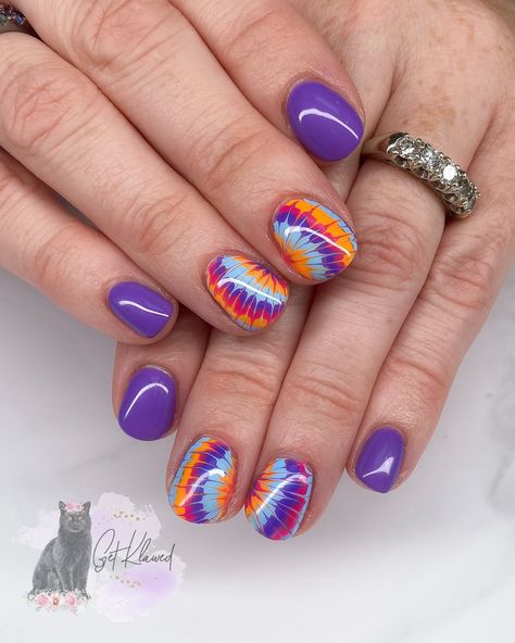 Feelin’ groovy with these purple vibes and tie-dye accents! 💜��✨ A little swirl, a lot of sass, and all the color magic. Who’s ready for a psychedelic nail journey? 🌈💅🏻 #tiedyenails #purpleperfection #nailartmagic #gelnails #nailart #shortnails #shortnailinspo #LEBrandAmbassador #GetKlawed #480nails #aznails #nailsmagazine #nails #nailsofinstagram #nailinspo #independentnailtech Nail Journey, Fall Ties, Feelin Groovy, Tie Dye Nails, Purple Vibe, Finger Nail Art, How To Tie Dye, Color Magic, Get Nails