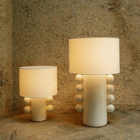 With its vertical score of sculptural spheres on a minimalistic cylinder base, the Tiglia Tall Table Lamp is a sophisticated contrast of both artful form and function. Designed by Kelly Wearstler & currently in stock! Kelly Wearstler Lamp, Tall Table Lamp, Visual Comfort Lighting, Tall Table Lamps, Tall Table, Form And Function, Kelly Wearstler, Visual Comfort, Table Lamp