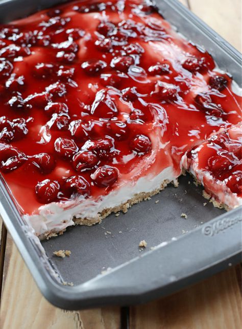 No-Bake Cherry Cheesecake. This No-Bake Cherry Cheesecake is a winner of a dessert! It’s so easy to make and it’s absolutely delightful! Three layers of total bliss! #cheesecake #nobakecheesecake #dessertrecipes #easydessert Cherry Cheesecake Surprise Layered Dessert, Cheesecake Layered Dessert, No Bake Cherry Cheesecake Bars, Best Ever No Bake Cheesecake, Easiest No Bake Cherry Cheesecake, Cheesecake Squares No Bake, Unbaked Cherry Cheesecake, Old Fashioned Cherry Cheesecake, No Bake Cherry Cheesecake With Cool Whip 9x13