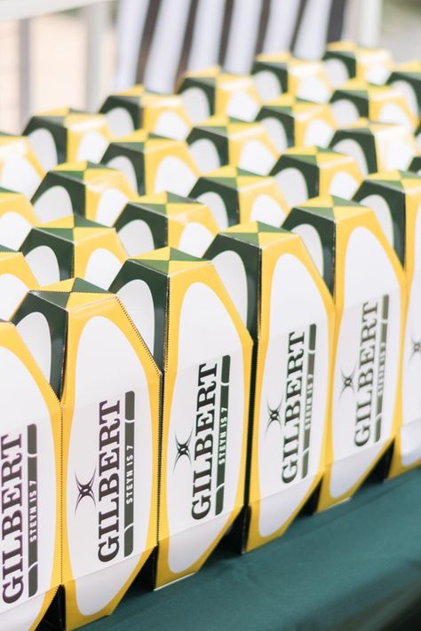 Rugby Ball shaped party boxes in Springbok Colours made by Chocnotes Nrl Themed Birthday Party, Springbok Rugby Theme Party Ideas, Rugby Party Ideas, Rugby Wedding, Rugby Party, Rugby Birthday, Springbok Rugby, Boys First Birthday Party Ideas, Party Boxes