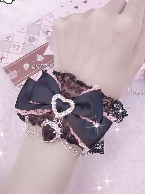 Introducing the Jirai Kei heart-shaped rhinestone charm bowknot wrist cuff with chains, available in 6 stunning color options. This wrist cuff features a charming heart-shaped rhinestone charm and a delicate bowknot design, adding a touch of kawaii and Lolita style to your outfit. The attached chains give it an edgy and unique look.   Please note that this product includes only one wrist cuff. Elevate your accessory game with this adorable and versatile wrist cuff! Harajuku Accessories, E Girl Outfits, Jirai Kei, Rabbit Rabbit, Fashion Inspiration Board, Pu Leather Bag, Choker Style, Wrist Cuffs, Turndown Collar