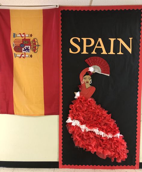 Spanish bulletin board for our school’s international fest. I found this idea on Pinterest and tried to recreate the flamenco dancer using a cardboard box and red and white tablecloths from Dollar Tree. Spain Bulletin Board Ideas, Spain Classroom Decoration, International Day Decoration At School, Spanish Party Decorations, Hispanic Heritage Month Bulletin Board, Display Boards For School, Spanish Festivals, Spanish Crafts, Spanish Party