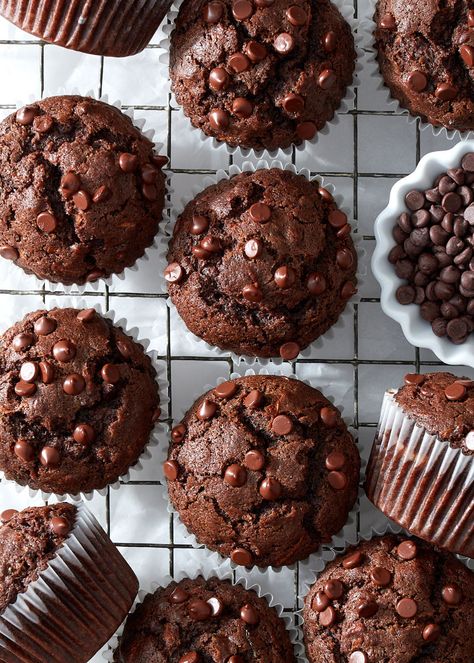 These double chocolate zucchini muffins are moist and fluffy, taste like indulgent chocolate cupcakes, and are secretly packed with grated zucchini. Quick and easy to make with no mixer required. Dairy-free and gluten-free friendly. #baking #summer | Get the recipe from forkknifeswoon.com! Low Carb Chocolate Zucchini Muffins, Chocolate Zucchini Muffins Gluten Free, Greek Yogurt Banana Muffins, Healthy Chocolate Zucchini Muffins, Healthy Double Chocolate Zucchini Muffins, Double Chocolate Zucchini Muffins Mary Berg, Mini Pumpkin Muffins, Double Chocolate Zucchini Muffins, Zucchini Muffins Healthy