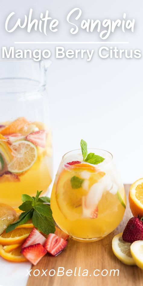 This mango citrus berry white sangria packs such a flavour punch. It’s a refreshing summer drink which everyone will love. Red sangria, made with red wine, might be the better known version, but this white sangria with summer fruit is the perfect choice for the summer. This is a super easy sangria recipe you can whip up anytime. If you are looking for a summer fruit cocktail recipe, you need to make this! #sangria #mango #lemon #orange #lime #strawberry #cocktail #whitewine #pitcher #summerdrink Iced Green Tea Recipe, Brunch Cocktail Recipes, Brunch Punch, Easy Alcoholic Drinks, Strawberry Cocktails, Green Tea Recipes, Brunch Spread, Iced Green Tea, Cocktail And Mocktail