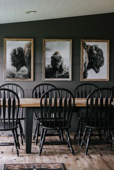 Learn how to create a cozy cabincore dining room with moody wall colors and stunning bison prints. Western Modern Dining Room, Moody Mobile Home, Western Farmhouse Dining Room, Double Wide Interior Remodel, Dining Room Shiplap Wall, Small Dining Room Ideas Cozy, Dining Room Repurpose Ideas, Farmhouse Dining Room Wall Decor Ideas, Shiplap Dining Room Wall