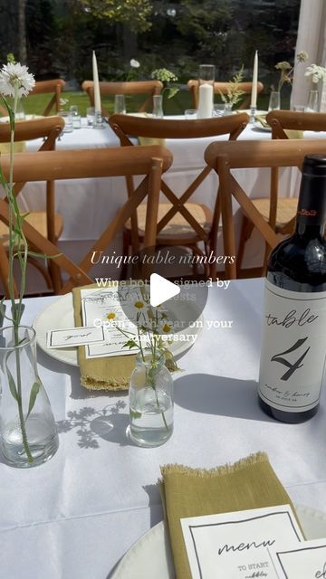 The Install Co on Instagram: "Still in love with this really cute table number idea from A&H’s wedding a few weeks ago. 🤍  Table numbers on wine bottles - each bottle signed by the guests on that table - crack open a bottle each anniversary and raise a glass to your guests. 🍷   Such a lovely idea to mark your wedding each year and think of all your favourite people who were there! 🫶🏻  Napkins: @theknottednapkinco  Pens: @sharpie   #wedding #weddingideas #weddingstyling #weddingtabledecor #weddingtablescape #weddingtablenumbers #weddingdecor #decorideas #southwalesweddings" Wine Bottle Table Numbers Wedding, Tall Table Numbers, Wine Bottle Table Numbers, Wine Bottle Guest Book, Bottle Table Numbers, Wedding Table Number Ideas, Unique Table Numbers, Wine Bottle Table, I Want To Get Married