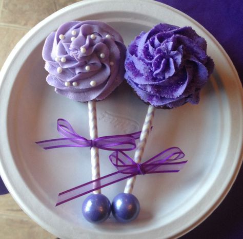 Baby Rattle Cupcakes - Lavendar Cream Cheese Frosting, Purple Buttercream frosting, striped straw/sticks, Bubble Gumball on the end Baby Rattle Cupcakes, Cupcakes Purple, Rattle Cupcakes, Baby Shower Desserts Girl, Purple Cake Pops, Wedding Shower Food, Baby Shower Cupcakes For Girls, Trendy Baby Shower Themes, Purple Cupcakes