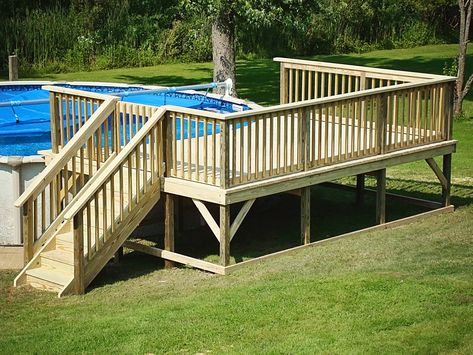 Above Ground Pool Deck Diy Pool Deck, Above Ground Pool With Deck, Pool With Deck, Oval Above Ground Pools, Deck Gate, Decks Around Pools, Solar Pool Cover, Above Ground Pool Deck, Amazing Swimming Pools