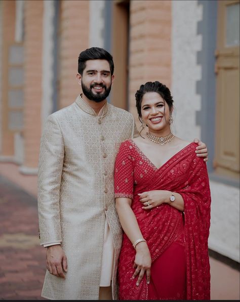 Couple Outfits Wedding Indian, Maroon Couple Outfits Wedding, Sarees For Wedding Brides, Engagement Couples Outfit, Groom Indian Engagement Outfits, Christian Wedding Blouse Designs, Reception Bride And Groom Outfit, Engagement Outfits Indian Couple Saree, Christian Wedding Outfits