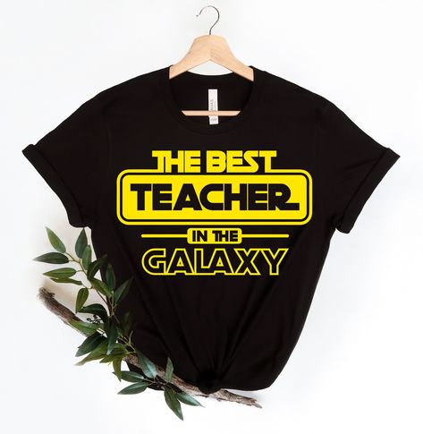 Excited to share the latest addition to my #etsy shop: Best Teacher in the Galaxy Svg, Game Sign, Clipart, Teacher Svg, Shirt Pattern, Star Wars, Digital Cut File, Instant Download https://etsy.me/3w2L2zy #kidscrafts #tshirtsvg #svg #funnysvg #inthegalaxy #mothersday # Star Wars Cricut Shirts, Teacher Space Shirts, Star Wars Teacher Shirts, Super Hero Shirts For Teachers, Star Wars Teacher Shirt, Teacher Superhero Shirt, Space Shirts, Star Wars Tshirt, T Shorts