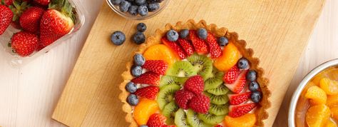 Fresh Fruit Flan | This fabulous dessert has just the right combination of freshness and sweetness. With fresh fruit dressed in a cream-covered flan and an almond crust, it doesn’t get more delicious. Fruit Flan Recipe, Fruit Flan, Fruit Birthday Cake, Almond Crust, Fresh Fruit Cake, Fresh Fruit Recipes, Flan Recipe, Fruit Tart, A Fruit