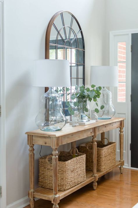 Welcome your guest in style with a pretty entry. Everett table styling with pretty lamps, arch mirror and baskets. #thehomeicreate #lamp #entryway #entrywaydecor  #entrywaydecorideas #thriftstorefinds Thrifted Lamps, Shabby Chic Entryway, Foyer Table Decor, Entryway Vintage, Vstupná Hala, Entry Table Decor, Lamp Ideas, Entryway Table Decor, Foyer Table