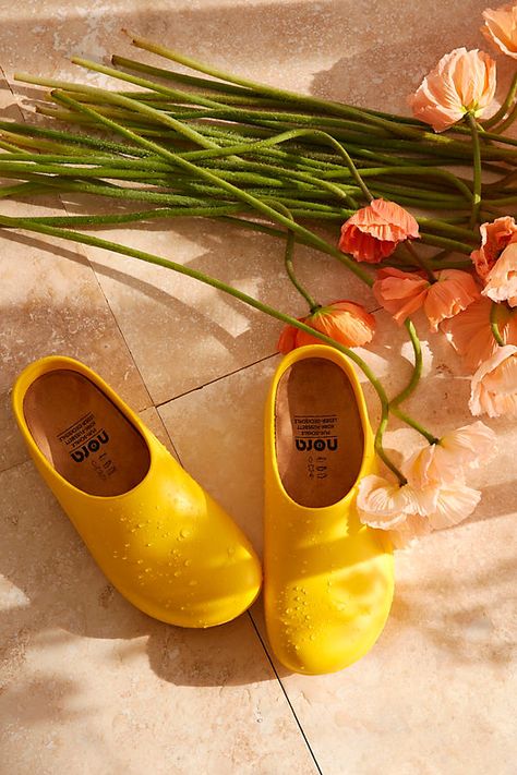 Made in Italy from CFC-free polyurethane foam rubber, these practical garden clogs are flexible, waterproof, and nearly indestructible. | NORA Garden Clogs, Yellow, Size: 37 at Terrain Practical Garden, Rubber Clogs, Garden Clogs, Yellow Fits, Easter Shopping, Polyurethane Foam, Garden Essentials, Western Boots, Nature Inspired