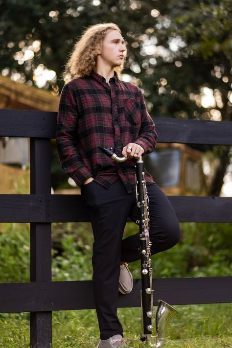 Boys Senior Picture band instrument Senior Picture Ideas Instruments, Band Senior Pictures Clarinet, Band Senior Picture Ideas, Clarinet Photo, Marching Band Pictures, Band Senior Pictures, Seniors 2025, Single Pictures, June Photography