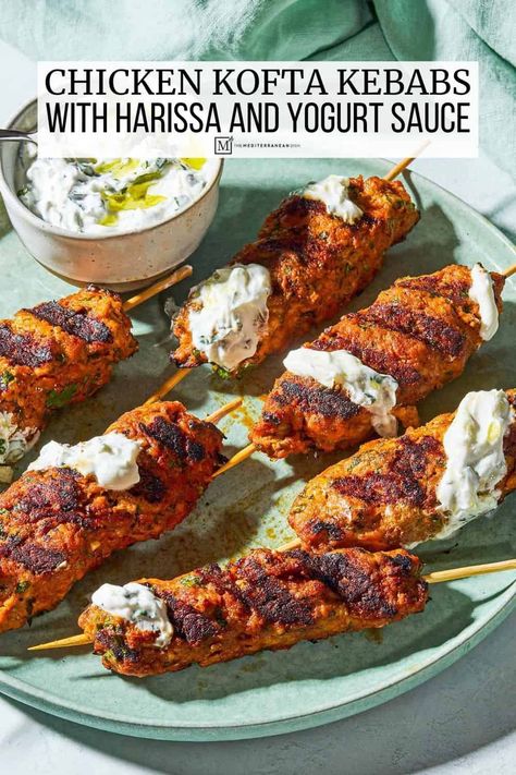 Spicy chicken kofta kebab recipe with ground chicken, harissa, and garlicky mint yogurt sauce. A flavor-packed grilled chicken recipe! Ground Chicken Kofta, Chicken Kofta Kebab, Chicken Adana Kebab Recipe, Ground Chicken Kebab Recipe, Chicken Kafta Recipe, Chicken Kafta, Chicken Harissa, Recipe With Ground Chicken, Chicken Kofta Recipe