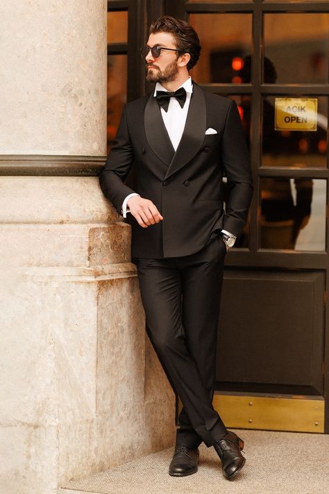 When sophistication meets style, you get our Black Double Breasted Tuxedo. The four-button blazer, adorned with shawl lapels, exudes unmatched elegance. Its double vent design ensures freedom of movement while maintaining a sleek profile. You'll be the embodiment of refined taste. #blackoutfit #blacktuxedo #tuxedo #formalattire #formalwear #mensfashion #suitup #tailored #specialoccasion #sophisticatedstyle #polishedlook #dapper #suit #mensstyle #fashion #gentleman Latest Blazer Design For Men, Double Breasted Pinstripe Suit, Black Double Breasted Suit, Wedding Suits Men Black, Suit For Men Wedding, Tuxedo Wedding Suit, Suits Groom, Designer Blazers For Men, Groom Suits