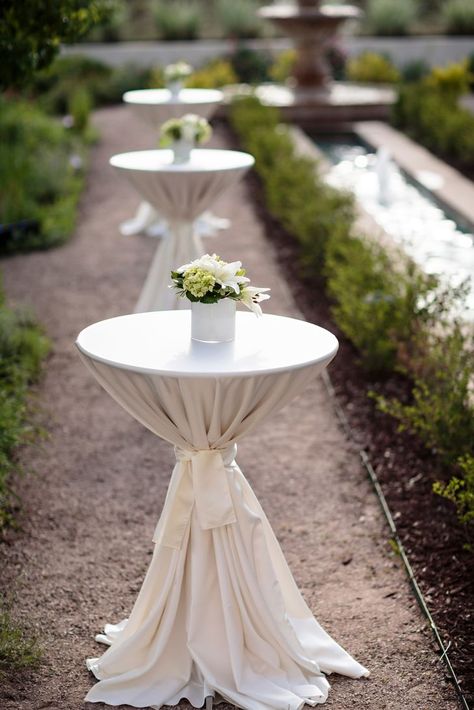 The cocktail tables were decorated with small centerpieces of lilies and hydrangea for a simpler reflection of the reception centerpieces. Wedding Cocktail Table Decor, Wedding Cocktail Table, Cocktail Table Centerpieces, Wedding Cocktail Tables, Cocktail Table Decor, Soft Pink Wedding, Popular Wedding Colors, Pink Wedding Colors, Tafel Decor