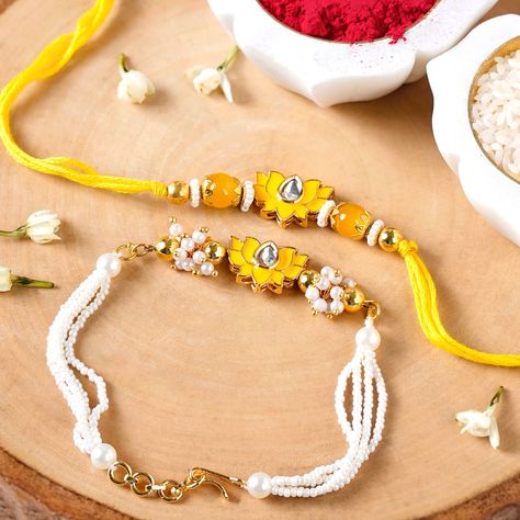 A little extra love never hurt anyone. 🫶💛🫰 Make Rakshan Bandhan memorable with our elegant Rakhi sets 🪢🛍️ Products included: 1. Kundan Stonework Pink Rakhi Hamper For Couple 2. Elegant Green Kundan Rakhi Hamper For Bhaiya Bhabhi 3. Stone And Pearl White Kundan Rakhi Set For Couple 4. Meenakari Yellow Lotus Rakhi Gift Hamper 5. Green Kundan Lotus Rakhi Gift Set For Bhaiya Bhabhi #rakhihampers #rakhigifts #rakhi2024 #rakshabandhangifts #rakhi #rakhiforbrother #rakhigiftideas #rakshabandhanh... Lotus Rakhi, Kundan Rakhi, Couple 4, Yellow Lotus, Rakhi Gift, Dried Fruit Mix, Home And Decor, Indian Sweets, Premium Gift