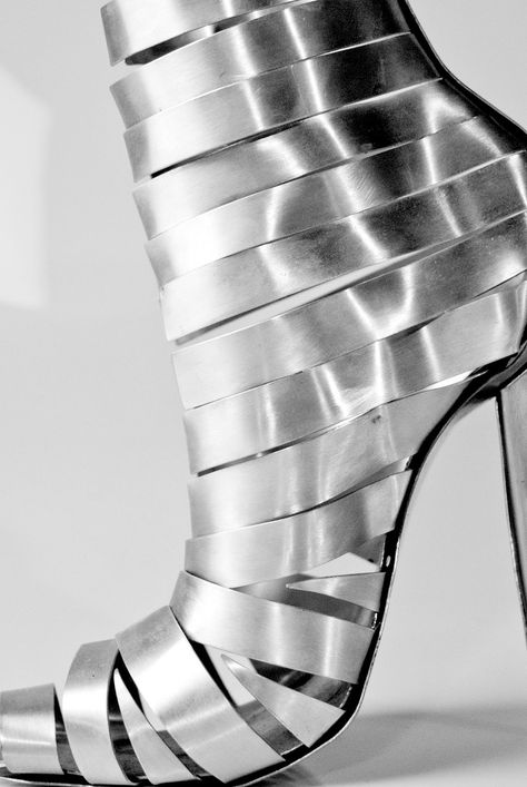 This is an unwearable shoe I made from strips of aluminium, with a steel sole cut using a water jet cutter. Water Jet, Silver Shoes, Best Hairstyles, Shiny Silver, Shoe Game, Hanging Out, Rubber Rain Boots, Silver Fashion, Me Too Shoes