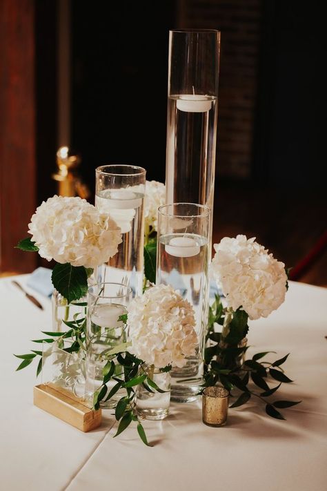 Cylinder Vase Centerpiece Wedding, Vases With Floating Candles, Cylinder Vase Centerpiece, Cylinder Centerpieces, Gala Centerpieces, Hydrangea Vase, Candle Table Decorations, Hydrangea Centerpiece, Wedding Centerpiece Ideas