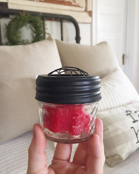 DIY Car Air Freshener! Pop a few wax melts in a mason jar with some holes in the lid. Place in your cupholder. The max will melt in the heat and you vehicle will smell amazing! EASY PEASY! | Little White House Blog Diy Car Deodorizer, Diy Car Air Freshener, Car Smell Good, Car Deodorizer, Room Deodorizer, Diy Wax Melts, Cleaning Stuff, Car Accessories Diy, Diy Air Freshener