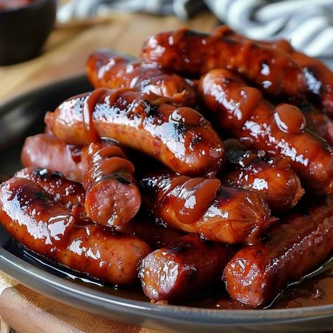 🔥 Mississippi Lil Smokies: Dive into the smoky goodness of these lil' treats at your next gathering! #SnackTime Mississippi Lil Smokies Ingredients: Lil smokies sausages (1 lb (450g)) Ketchup (1 cup (240ml)) Brown sugar (1/2 cup (100g)) Worcestershire sauce (2 tbsp (30ml)) Hot sauce (1 tsp (5ml)) Instructions: Combine all ingredients in a slow cooker. Cook on low for 4 hours. 🌭 Perfect party snack, guaranteed to disappear fast! #LilSmokiesLove Fast Food Appetizers, Twist Recipes, Lil Smokies, Happy Hour Food, Sausage Dishes, Food Babe, Party Snack, Trending Recipes, Sweet Snacks Recipes