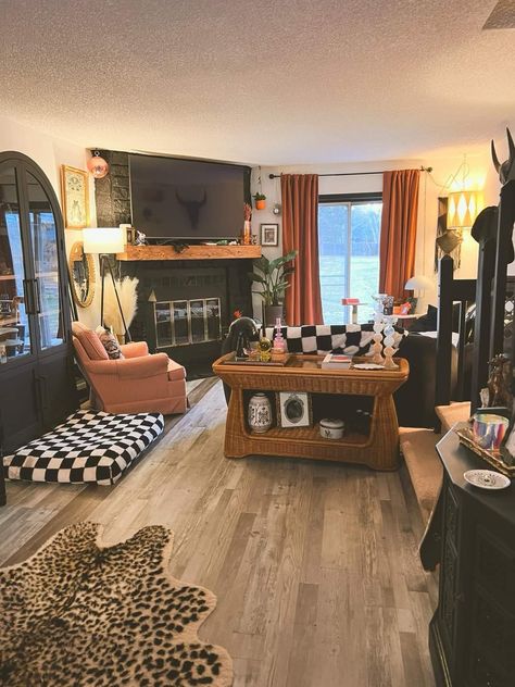 Mobile Home Set Up Ideas, Cozy Maximalist House, Punchy Living Room, Small Trailer Living Room Ideas, Living Room Tv In Front Of Window, Cluttered Home Aesthetic, Electric Style Interior, Dark Western Boho Living Room, Thrift Living Room Ideas