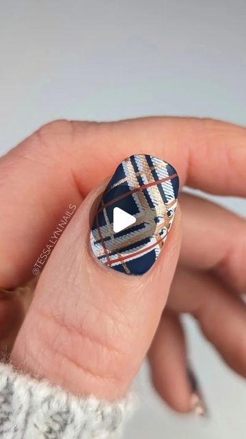 Tessa | DIY Nail Art on Instagram: "Thanksgiving Plaid Tutorial 🎥🧣🦃🧥🍂 • • • Brands linked in bio 💸 • Polish: @oliveave_polish Nourishing Base Coat, MOTN, Matte Top Coat @orly Rose-Colored Glasses @hellomaniology Jack, Nutmeg, Shibori, Bam White, Smudge-Free Top Coat 🦃 Plates: @hellomaniology M023 @uberchicbeauty Pretty in Plaid • • • #nailstampingart #nailart #thanksgivingnails #stampednails #fallmani #plaidnails #mattenails #nailtutorial #nailartvideo Fall nail art, nail stamping, plaid nails, Thanksgiving nails art, stamping tutorial, nail art video" Basket Weave Nail Art, Plaid Nails Tutorial, Plaid Nails Fall, How To Paint Plaid Nails, Plaid Nail Design Tutorial, How To Do Plaid Nails, Nail Art Designs For Fall Plaid, Flannel Nail Art, Fall Plaid Nail Designs