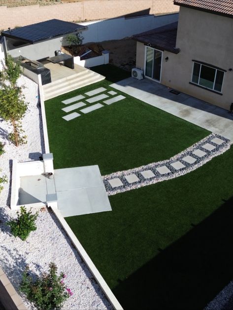 Check out this modern backyard makeover using artificial grass, pavers and concrete. Grass And Pavers Backyard Ideas, Grass And Pavers, Modern Backyard Design, Grass Pavers, Best Artificial Grass, Backyard Walkway, Artificial Grass Installation, Backyard Layout, Pavers Backyard