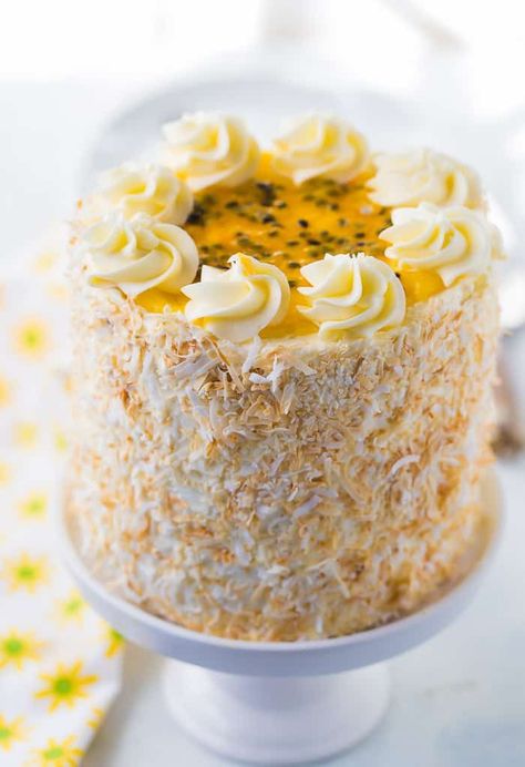 A tropical delight, this passionfruit coconut layer cake is bursting with the sweet and tart flavors of coconut and passionfruit. Coconut Cake Design Ideas, Coconut Birthday Cake Ideas, Coconut Cake Design, Coconut Cake Decoration Ideas, Coconut Wedding Cake, Passion Fruit Filling, Coconut Birthday Cake, Coconut Cake Decoration, Coconut Layer Cake