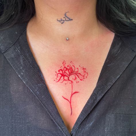 This delicate spider lily made such a beautiful composition with the piercing and the neck tattoo! Ufff 🤌🏻🤌🏻🤌🏻 . . . . . . . #floraltattoo #colortattoo #botanical #sternum #delhitattooartist #femaletattooartist #pokeyza Spider Lily Neck Tattoo, Spider Lily Tattoo Collar Bone, Red Spider Lily Neck Tattoo, Spider Red Lily Tattoo, Red Spider Lily Tattoo, Spider Lily Tattoo, Red Spider Lily, Female Tattoo Artists, Fire Tattoo