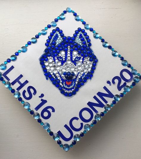 completely bejeweled UConn Husky grad cap #gradcap #huskies #graduation #mortarboard #uconn Uconn Graduation Cap, Uconn Grad Cap, Grad Cap Ideas College Logo, High School Graduation Cap Designs, Senior Things, Grad Cap Decorated, Graduation Cap Decoration Diy, High School Graduation Cap, College Graduation Cap Decoration