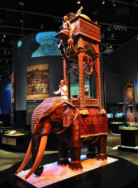 The Elephant Water Clock is an iconic example of one of al-Jazari’s pieces of fine technology. In addition to telling the time, it celebrates the universality of Islam by incorporating elements from Spain, Phoenicia, Egypt, Iraq, India and China History Of Robots, Islamic Science, Islam History, Elephant Clock, Muslim Scholars, Abbasid Caliphate, Water Clock, Arts And Science, Museum Of Science